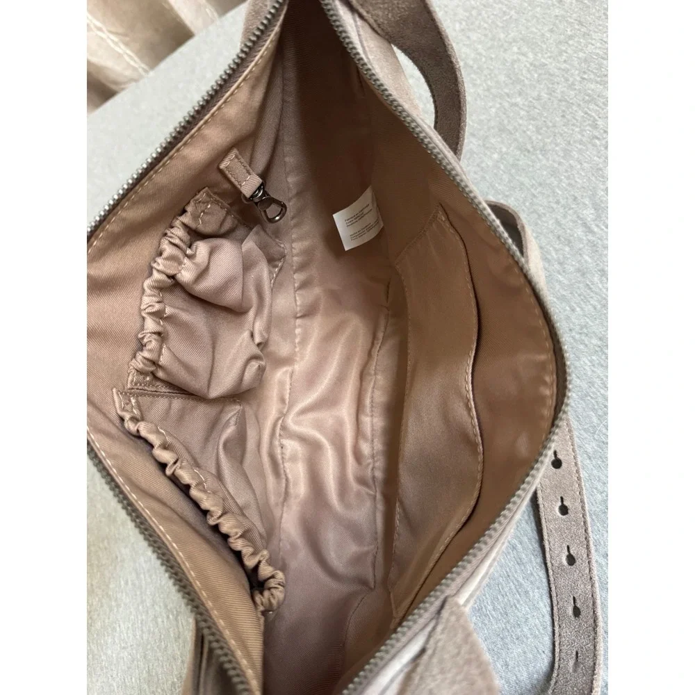 The Sak Suede Saddle Crossbody Bag in Taupe Brown